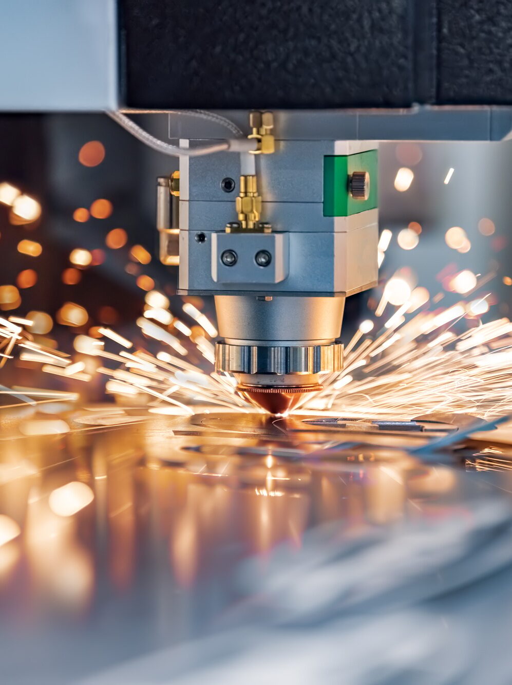 CNC Laser cutting of metal, modern industrial technology.